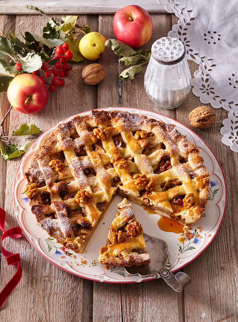 Covered apple lattice cake with walnuts and cinnamon