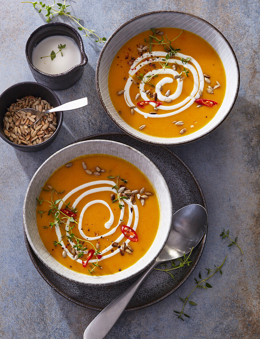 Pumpkin soup with thyme and pumpkin seeds