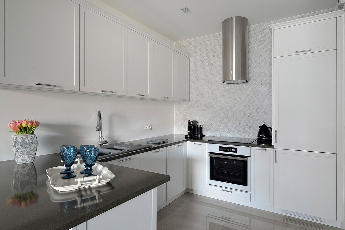 Modern kitchen with white cabinets