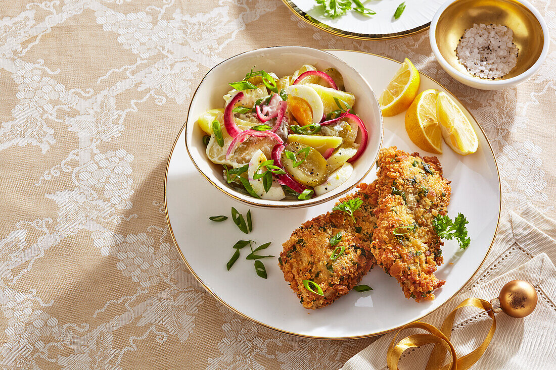 Carp in a lemon and herb crust with cucumber and onion salad