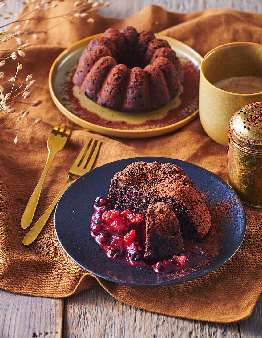 Chocolate and chickpea bundt cake with fruit sauce