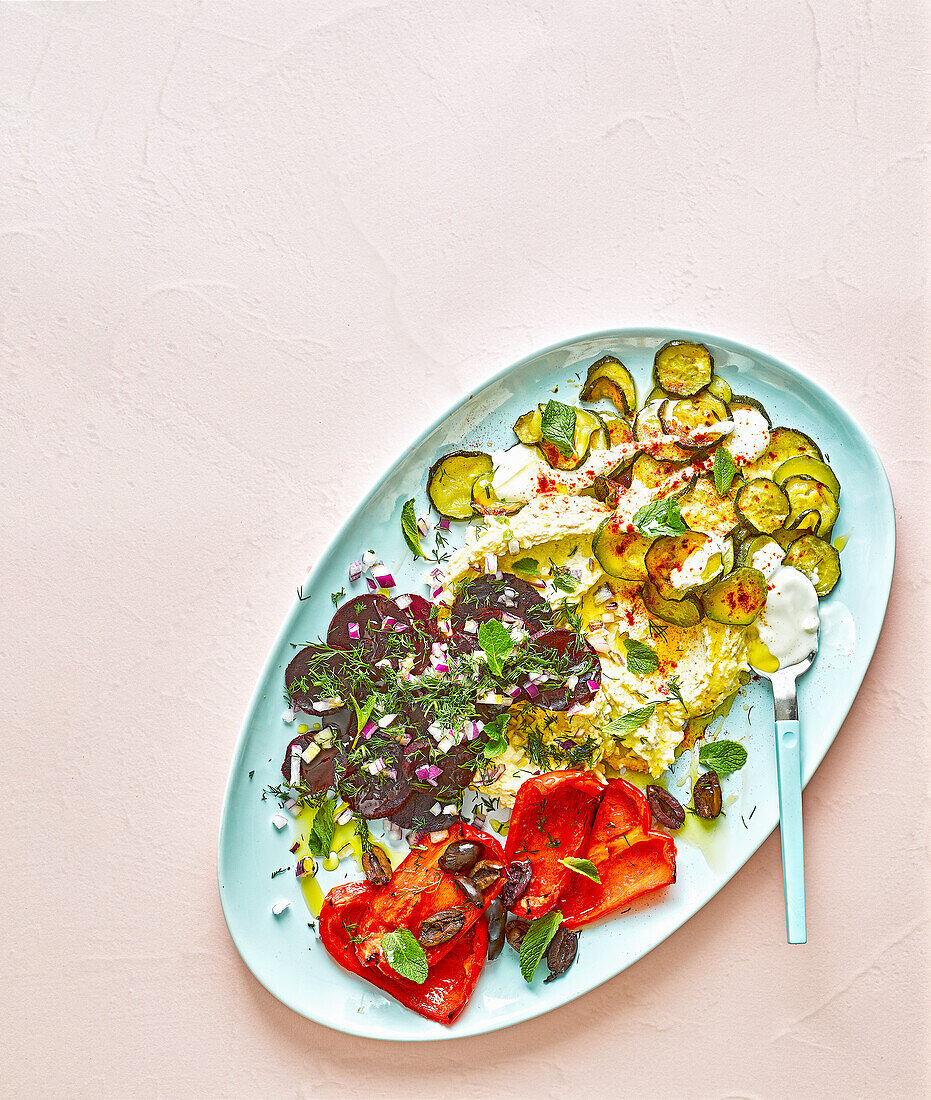 Roasted vegetables with yoghurt dip and fresh herbs