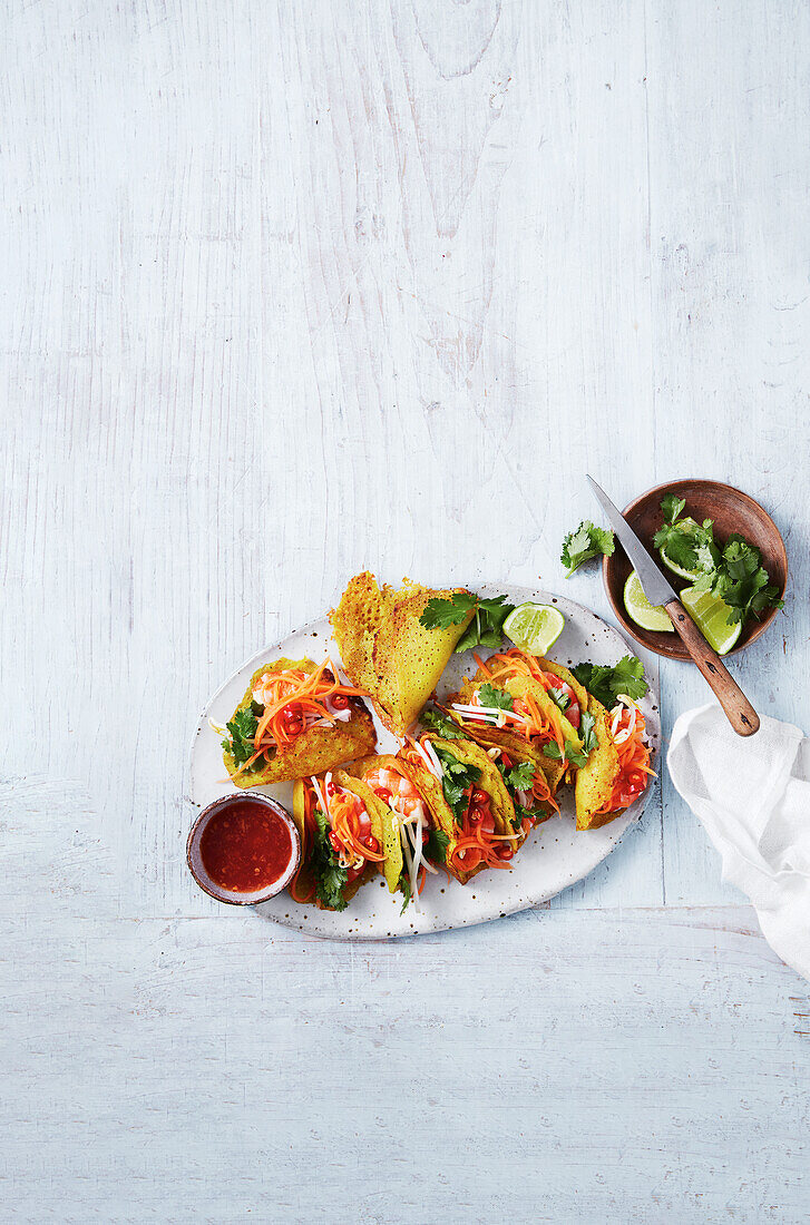 Vietnamese mini crepes with vegetable filling and dip