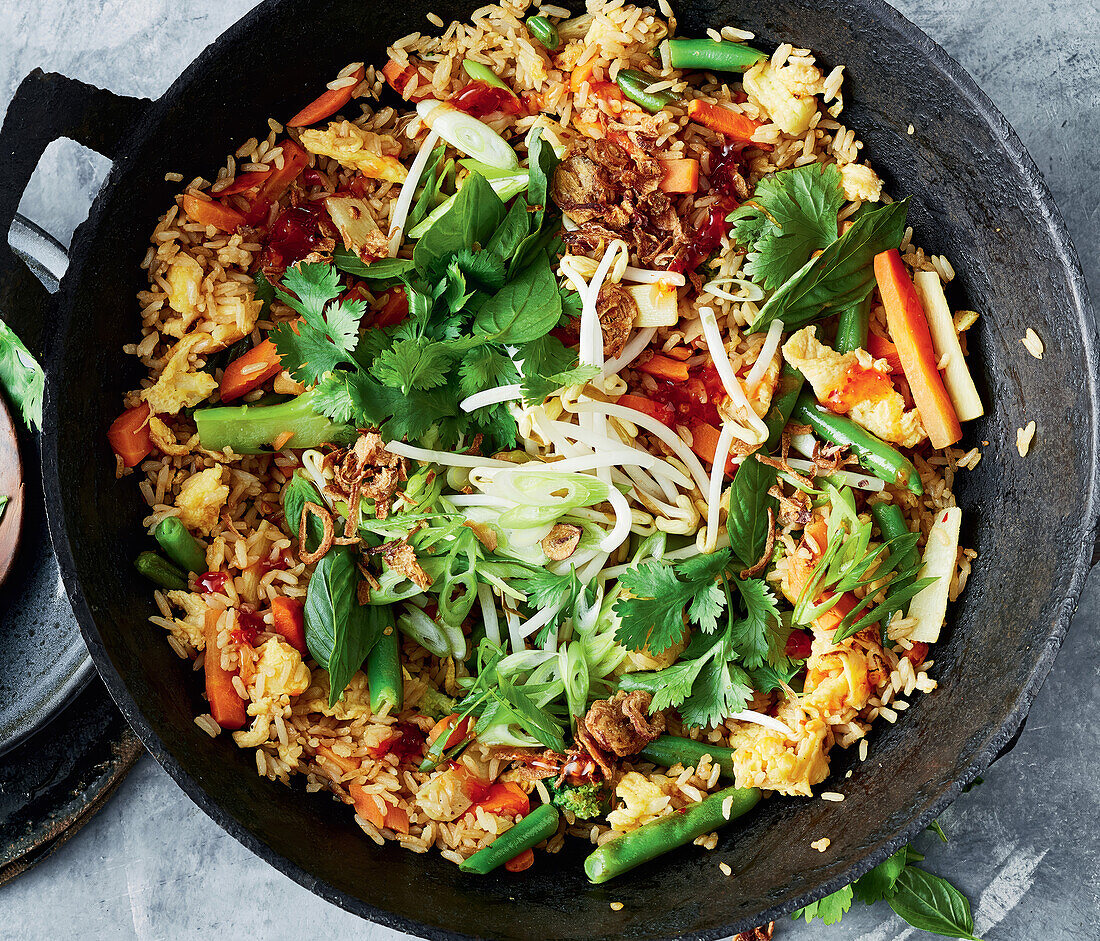 Thai-style fried rice with vegetables and herbs
