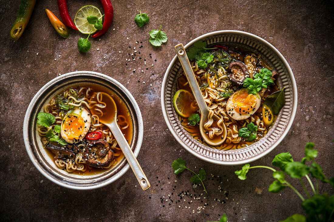Two ramen variations with marinated egg and shiitake
