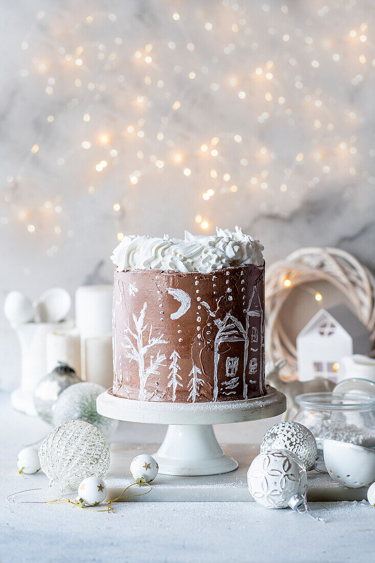 Chocolate Christmas cake, hand-painted with white food colouring