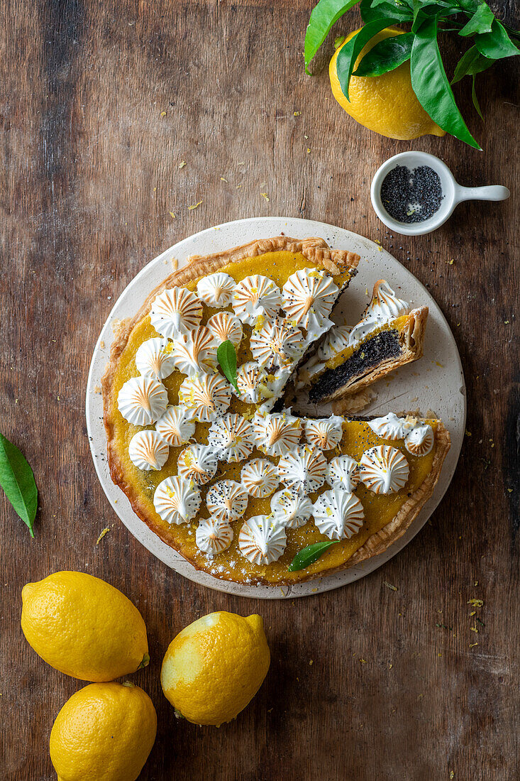 Lemon curd poppy seed cake with meringue dots