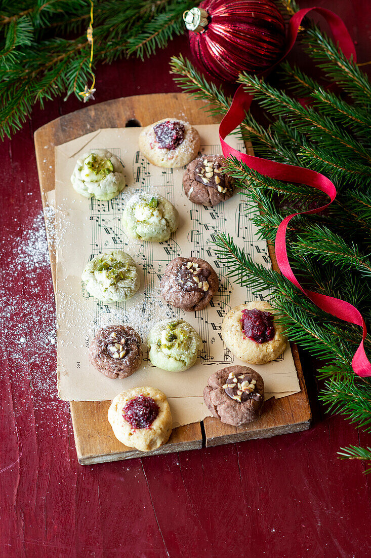 Thumbprints with jam, chocolate and pistachios
