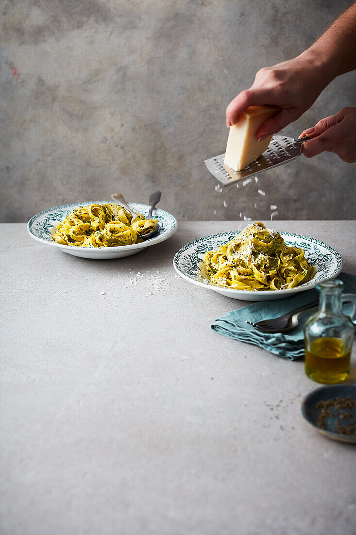 Fettuccine with walnut and sage pesto and freshly grated cheese