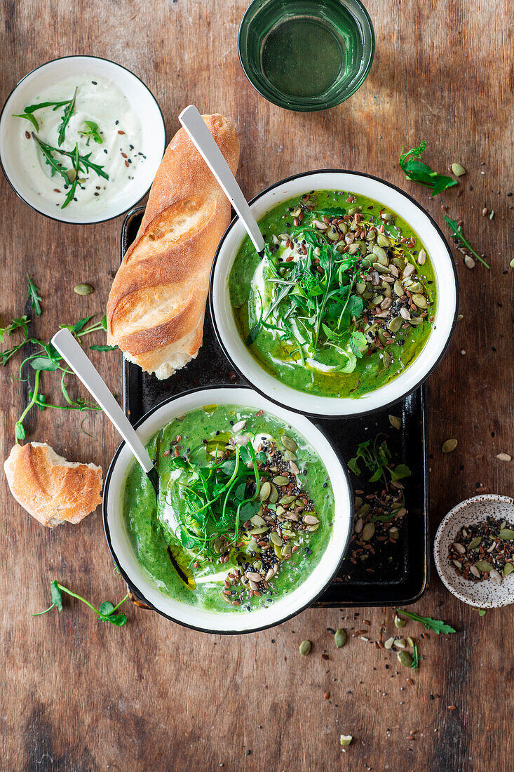 Broccoli soup with seeds and rocket