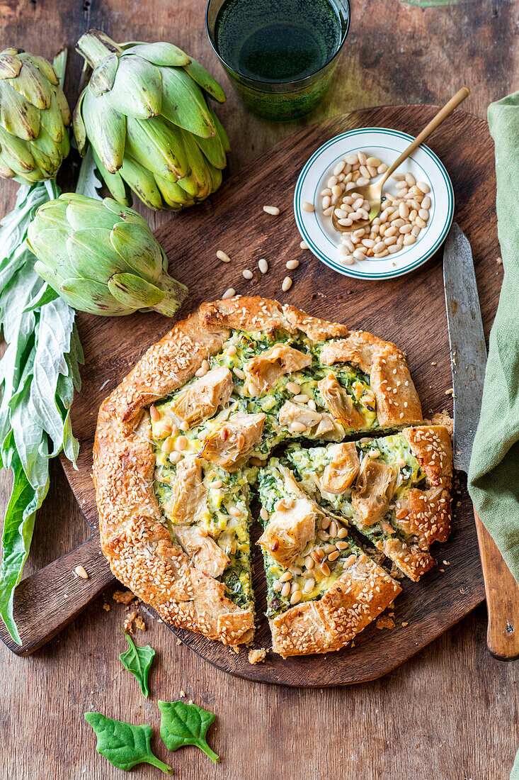 Artichoke galette with spinach and pine nuts