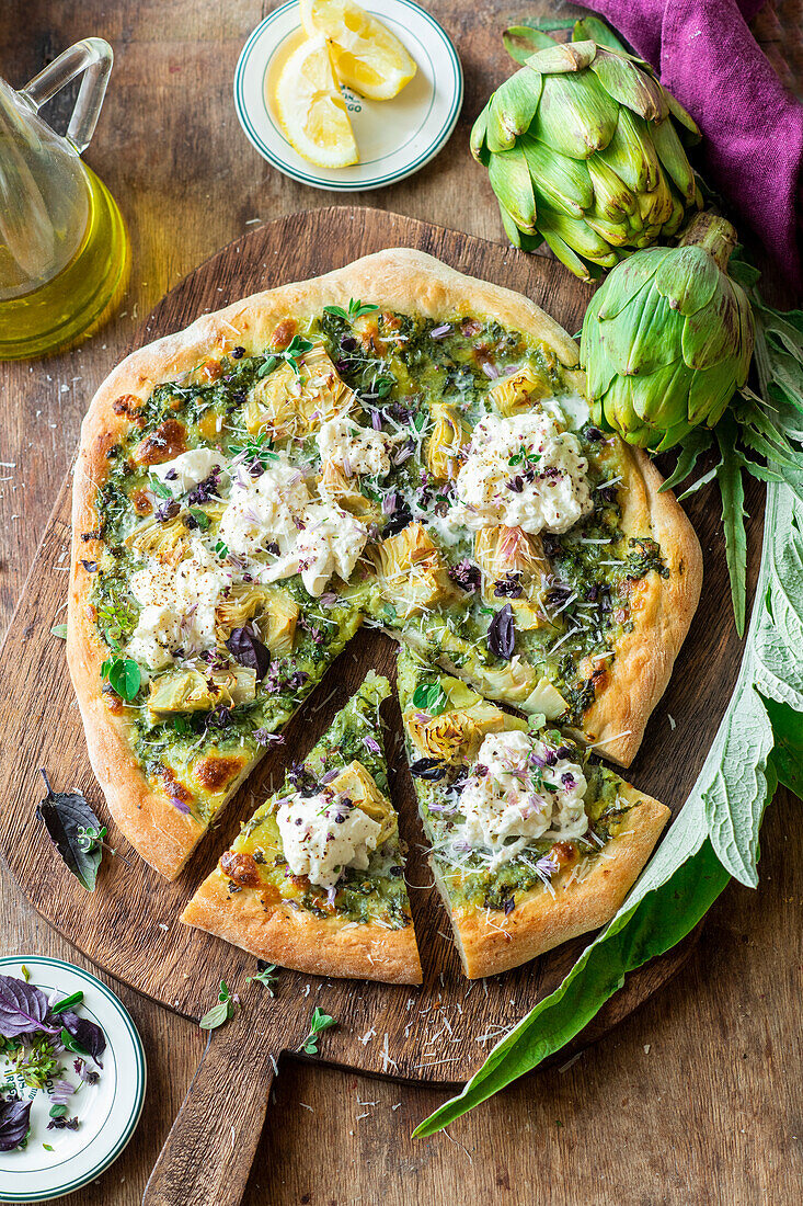 Artichoke pizza with fresh herbs and parmesan