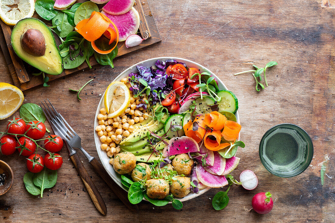 Buddha bowl with quinoa balls and fresh vegetables