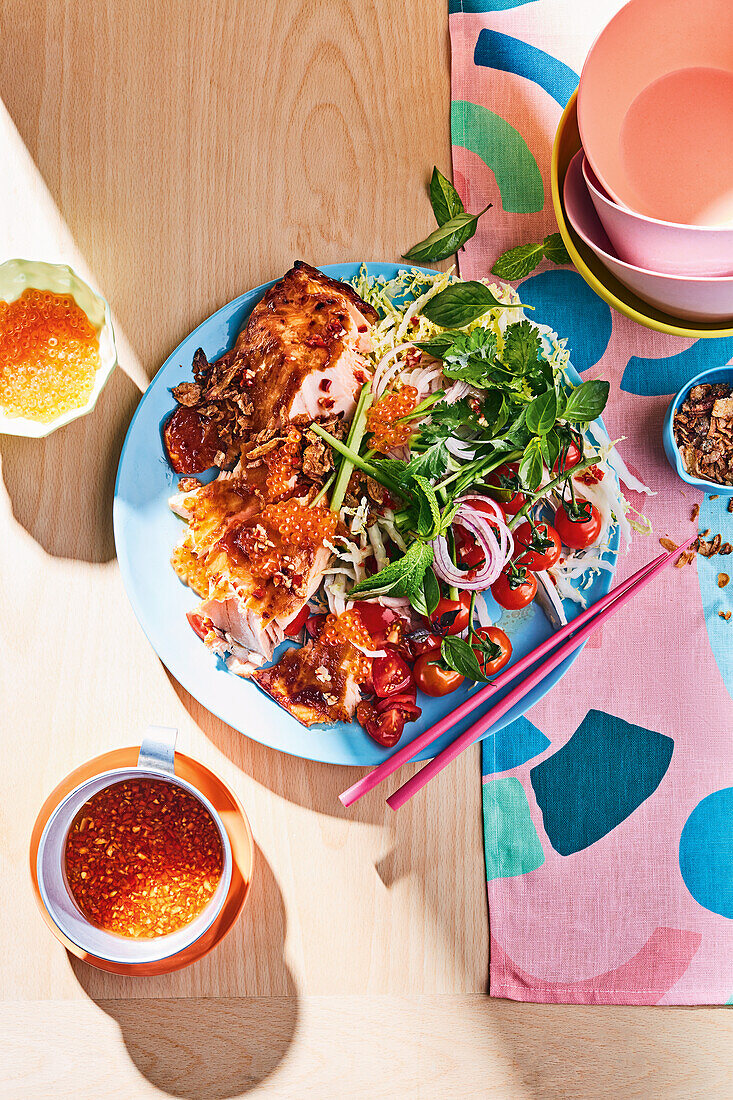 Asian salad with fried chicken and chilli dressing