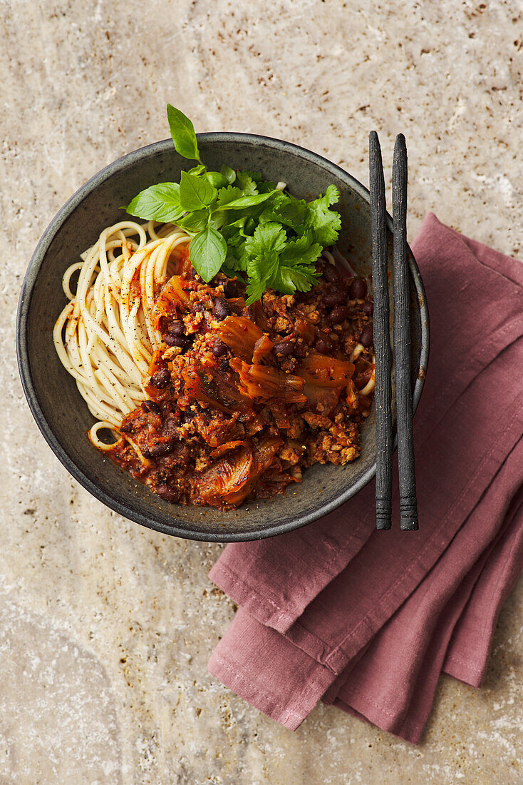 Udon noodles with black beans, minced chicken and kimchi