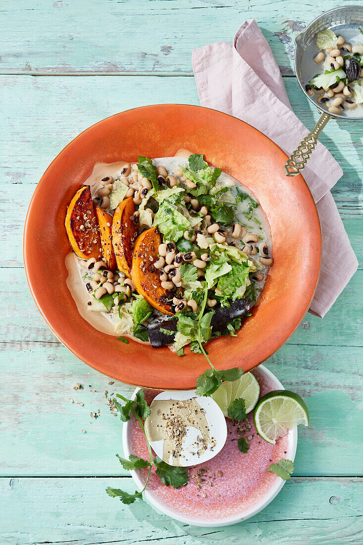 Indian oven-baked pumpkin curry with black-eyed beans