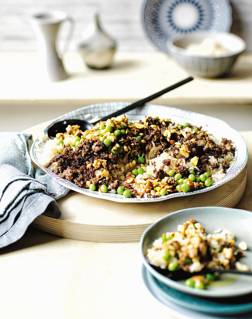 Fried rice with peas, minced meat and Mediterranean spices