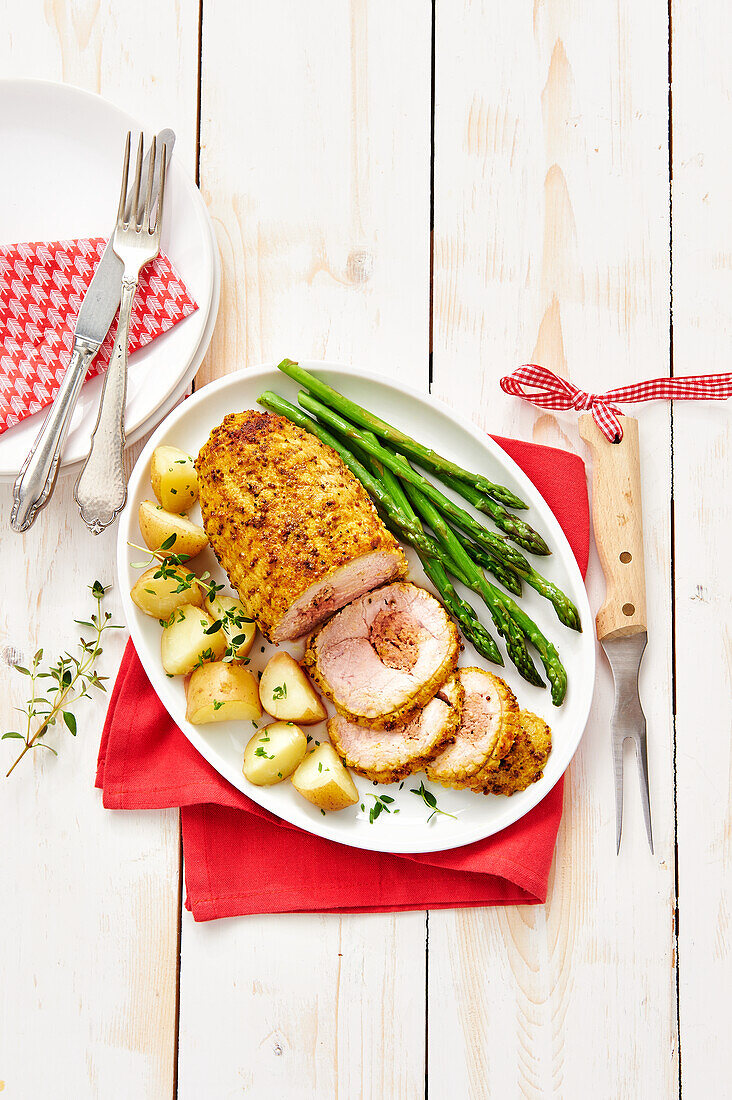 Fricandeau roll roast with honey-mustard crust and potatoes