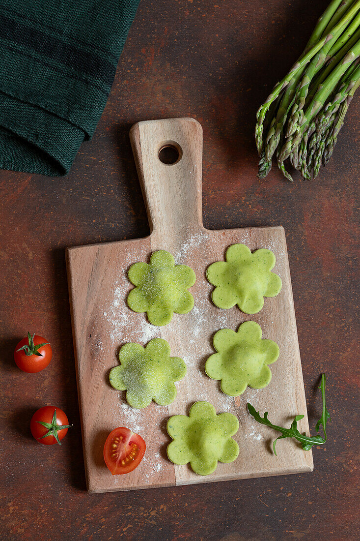 Green ravioli with rocket and ricotta filling