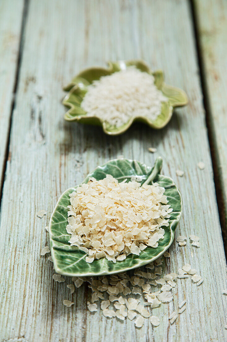 White rice grains and rice flakes