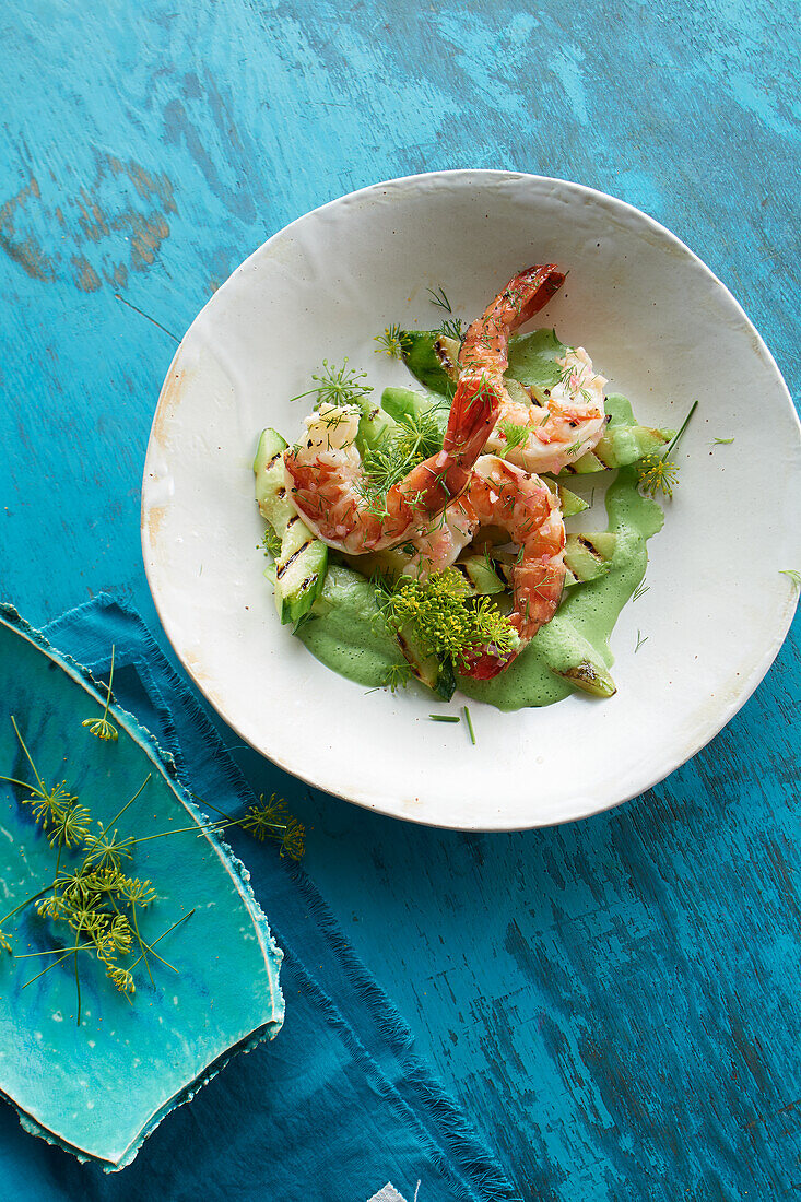 Prawns with warm dill vinaigrette and grilled cucumber