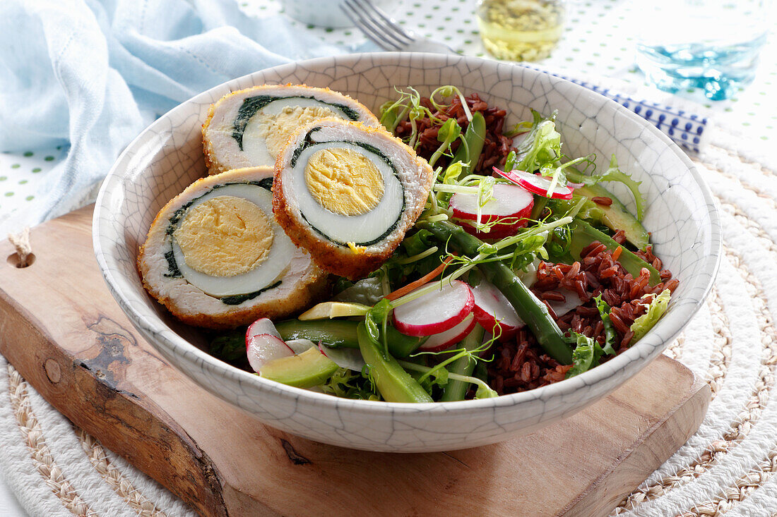 Chicken fillet stuffed with spinach and egg with spring salad