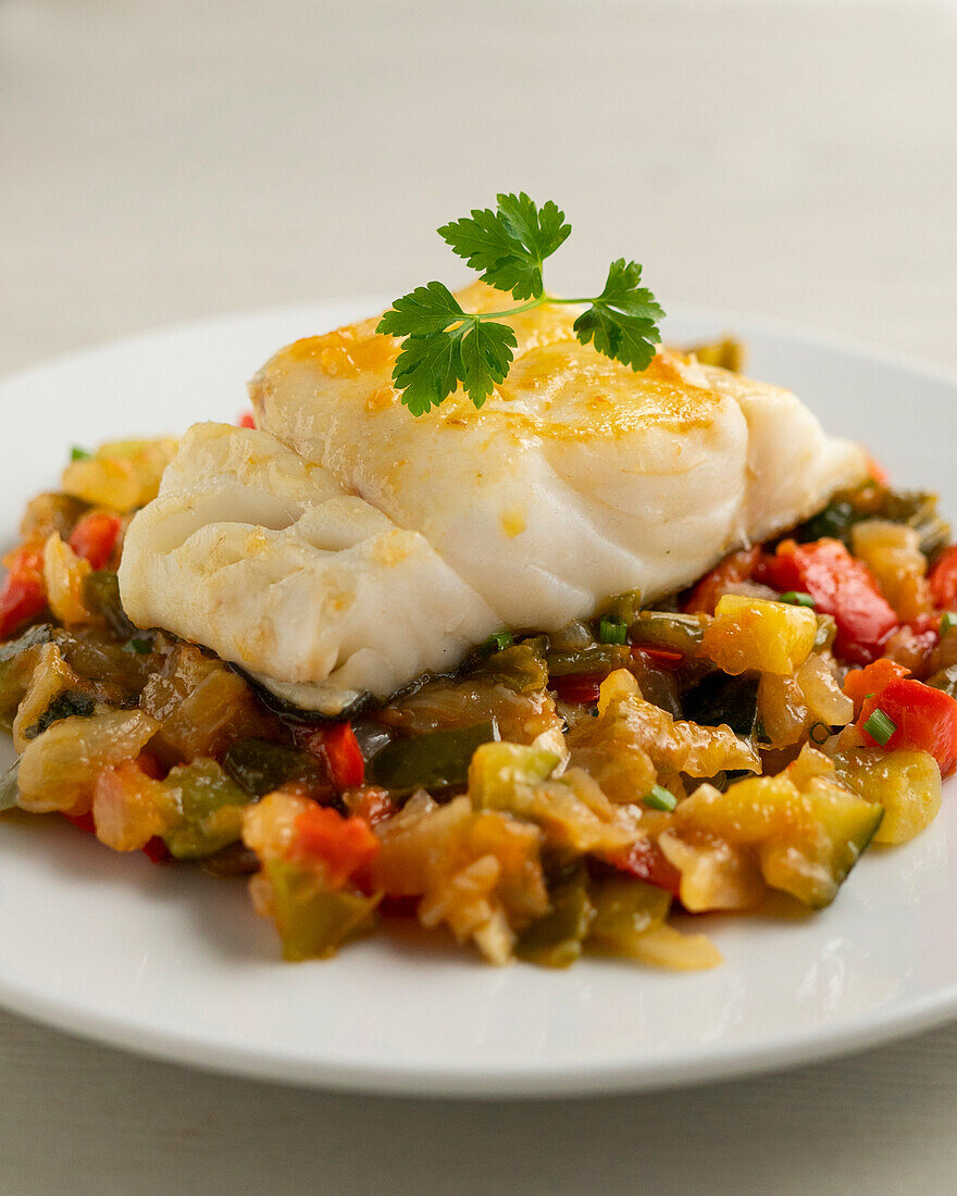 Steamed cod with Sanfaina vegetables