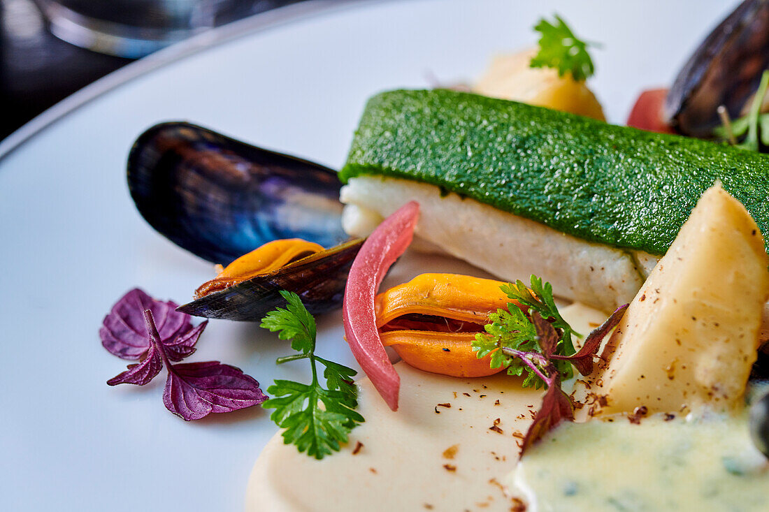 Fried sole in herb crust with bouchot mussels and celeriac puree