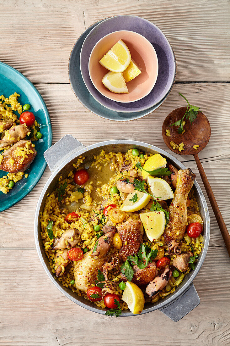 Paella with calamari and two kinds of poultry