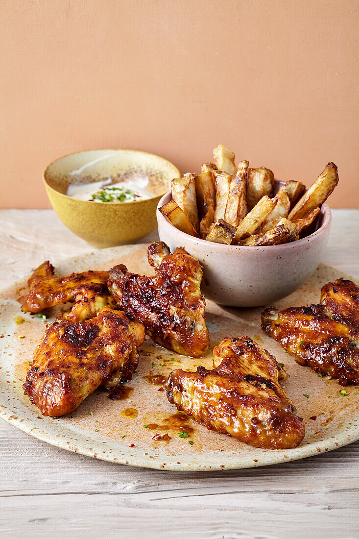 Chicken wings with Jerusalem artichoke fries