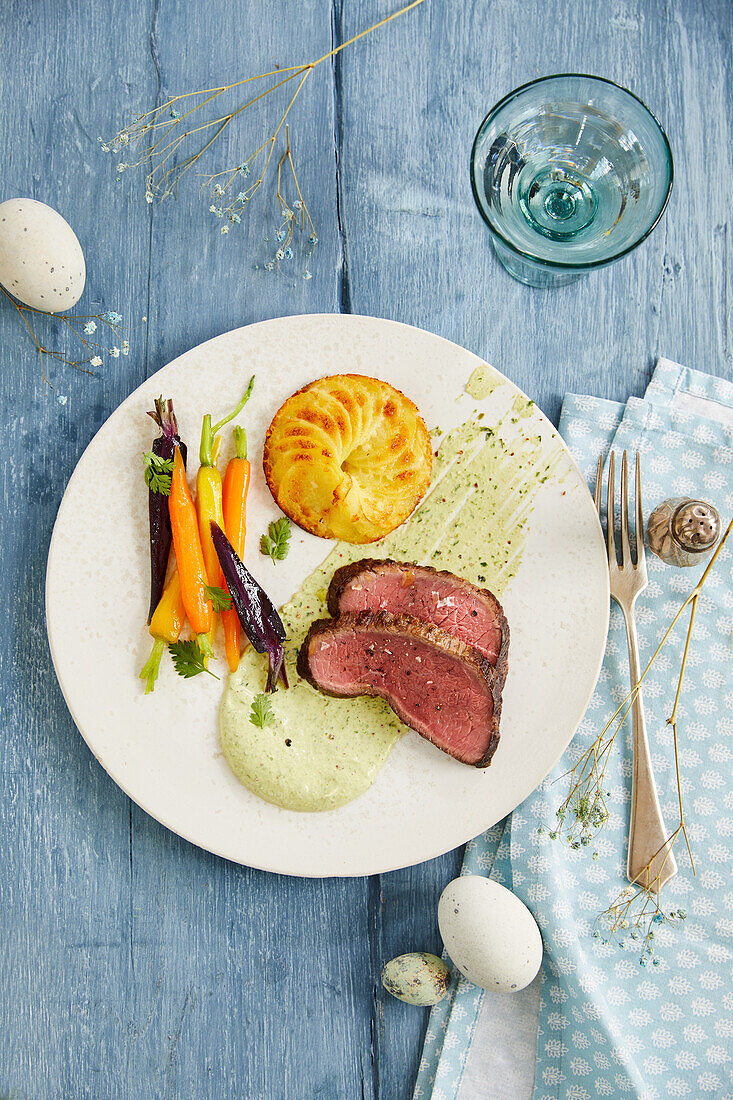 Boiled beef with au gratin dumplings and green sauce