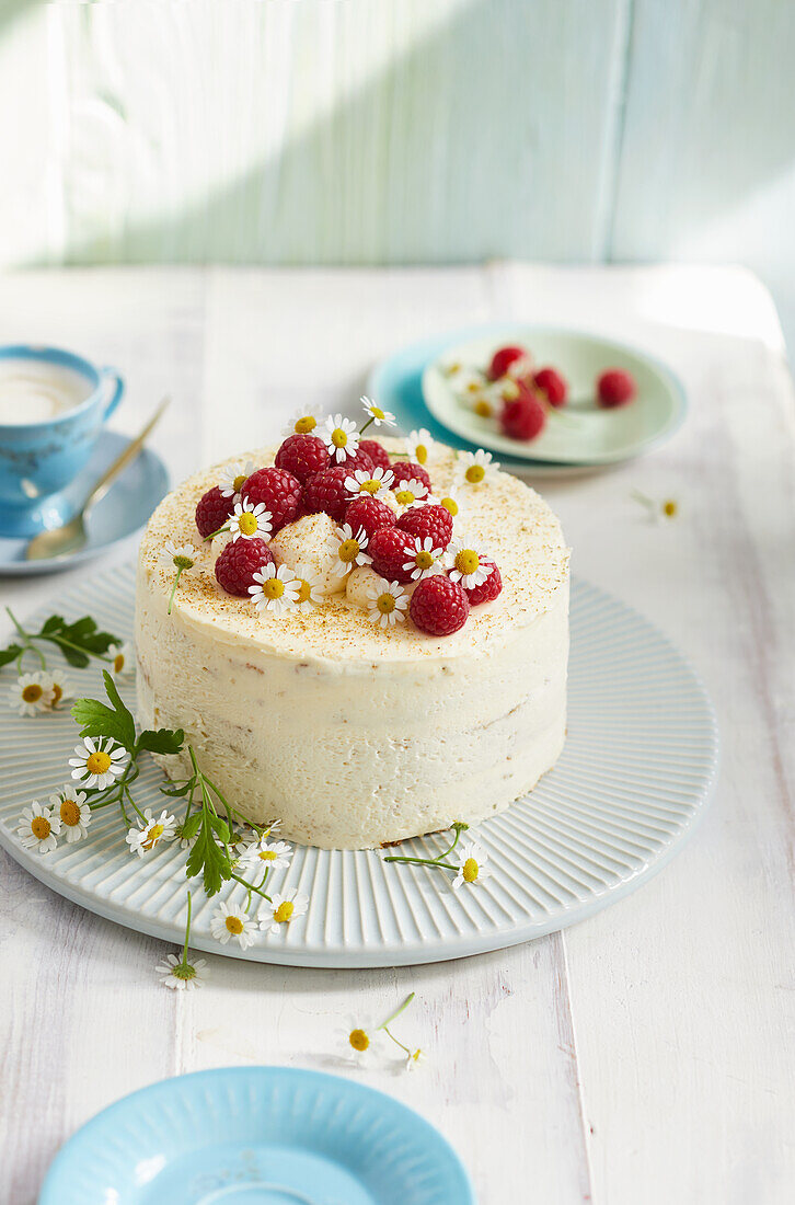 Limoncello naked cake with raspberries