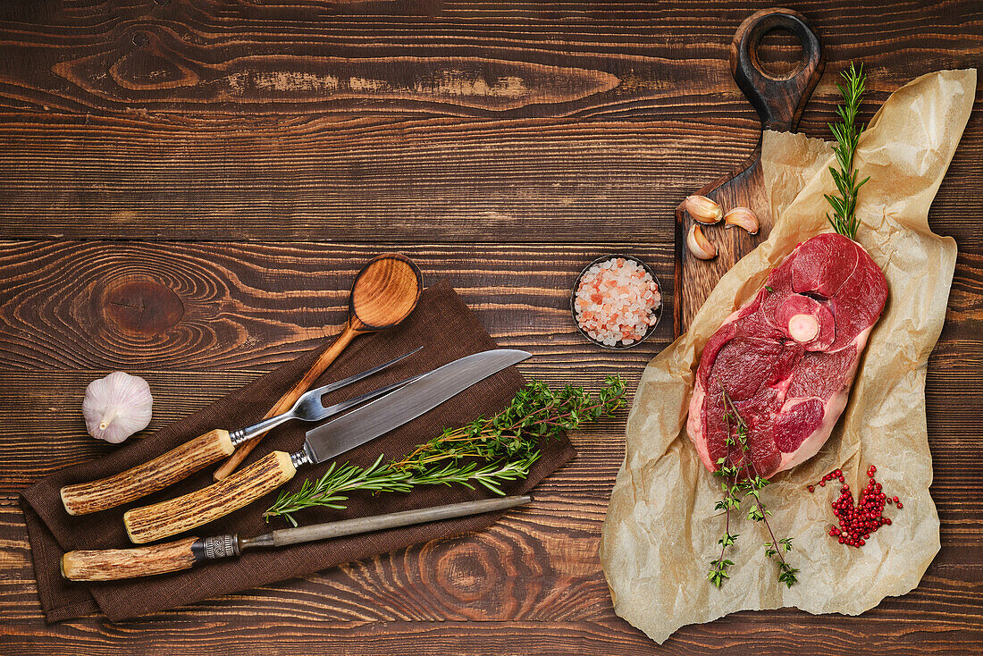 Raw beef steak with herbs and spices