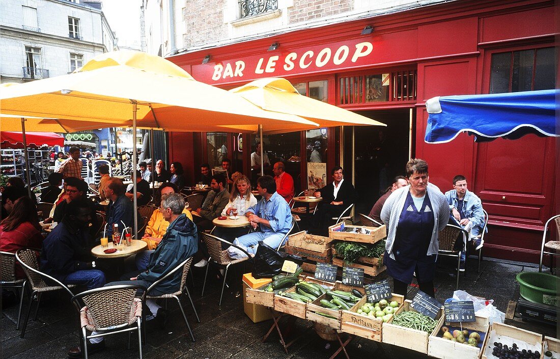 Vegetable stall beside a bar on Marche des Lys, Rennes