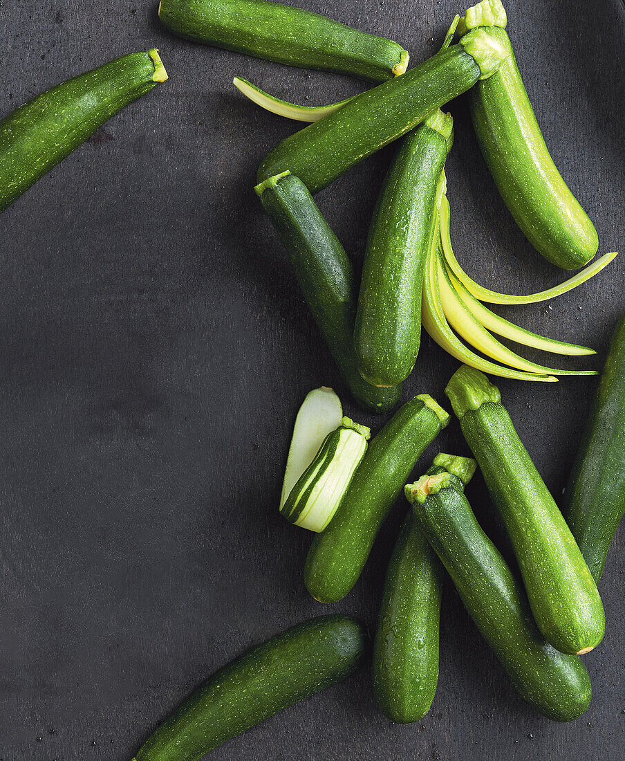 Fresh courgettes, partly sliced lengthways