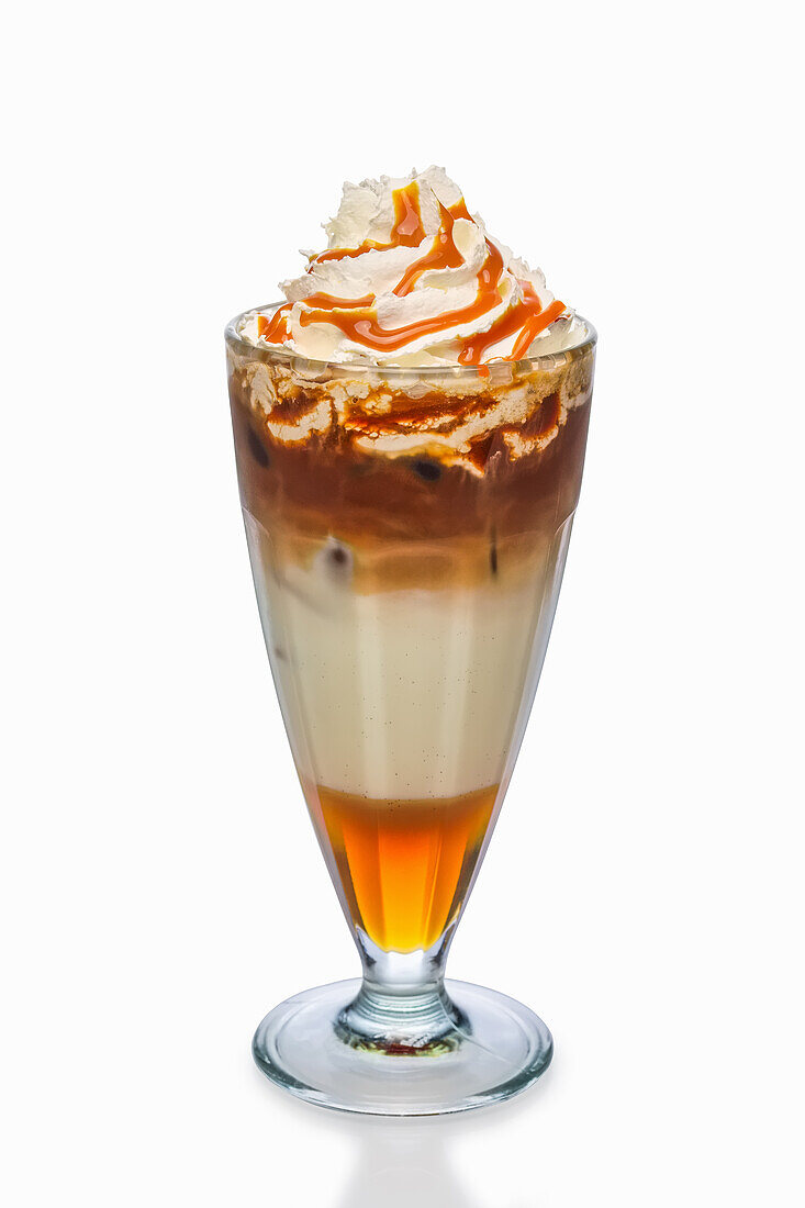 Iced coffee with caramel syrup and whipped cream