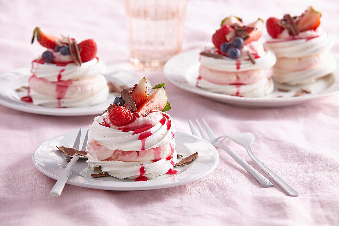 Mini pavlova with fresh fruit and maraschino syrup