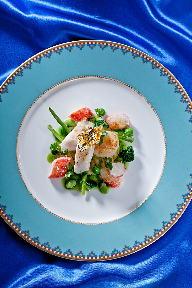 Bucatini with St Peter's fish, scallops and peas