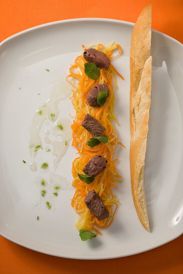 Carrot salad with mint and roasted lamb fillet