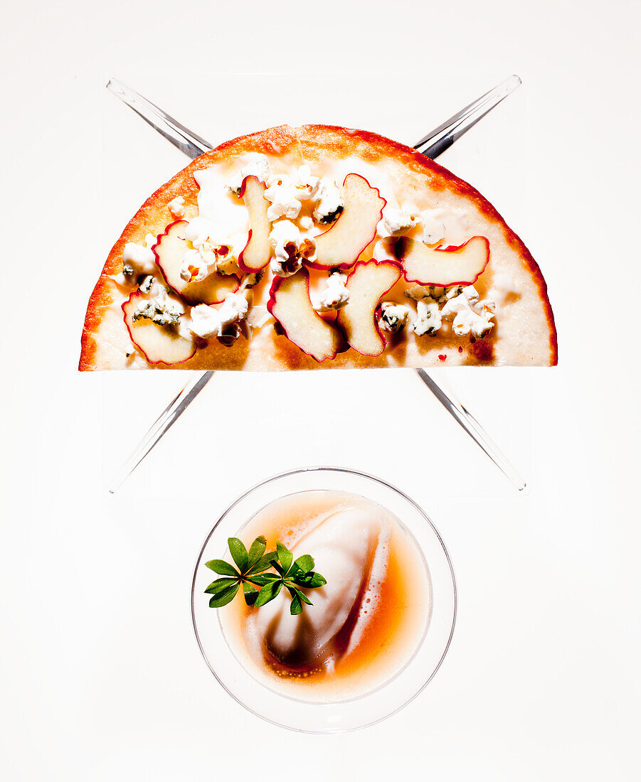 Cold woodruff and lemongrass punch with rhubarb and gorgonzola pizza