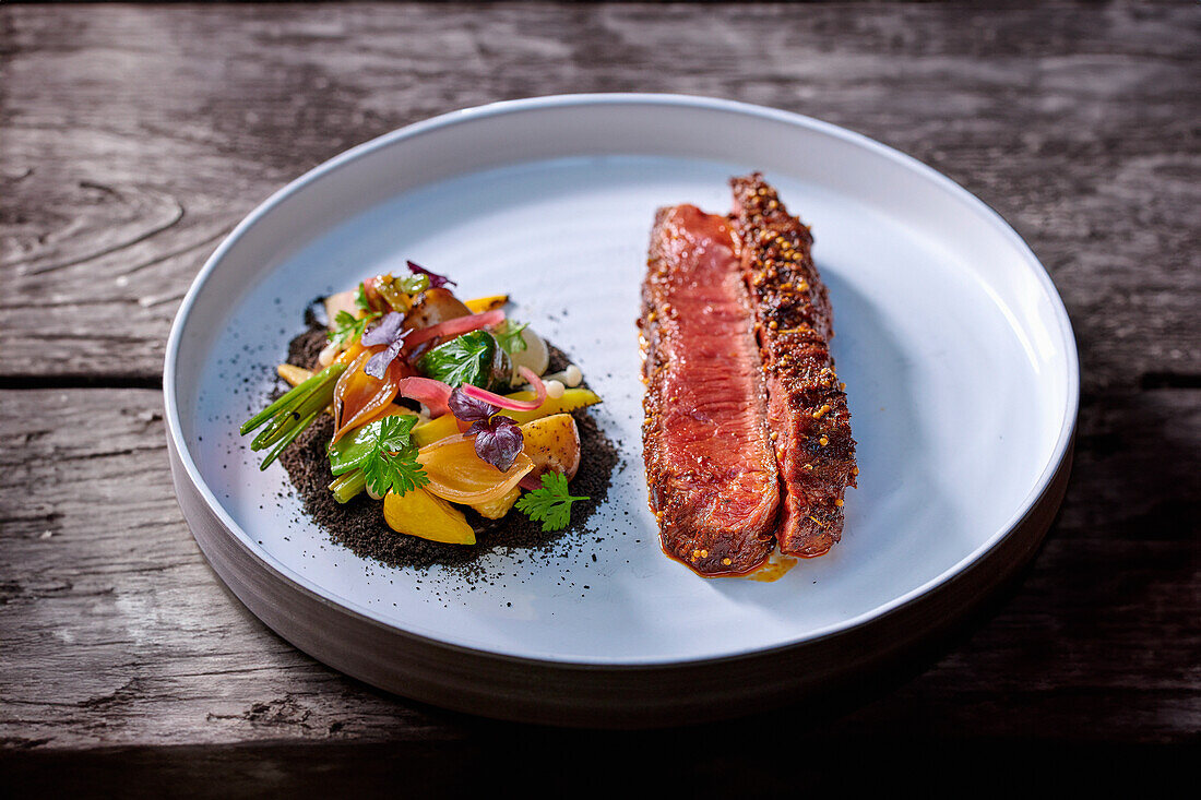 Black Angus steak with vegetables and chimichurri