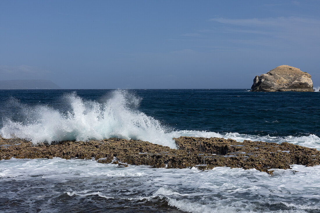 Waves breaking on rocks in Guadeloupe, Caribbean