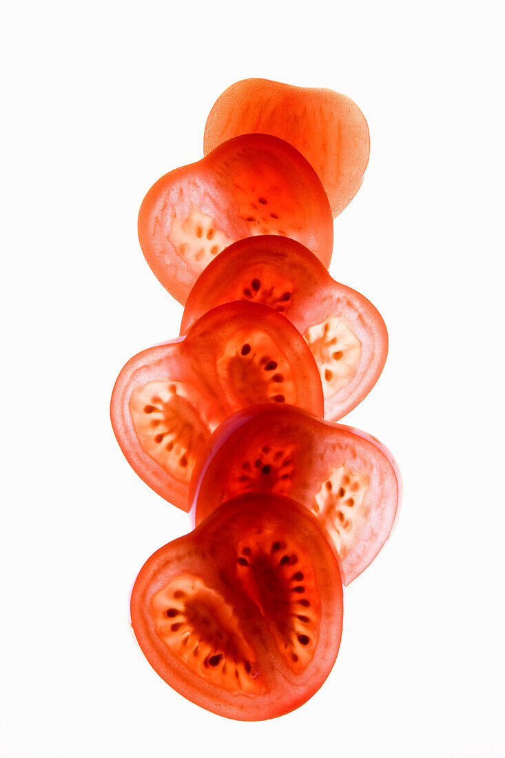 Tomato slices on a white background