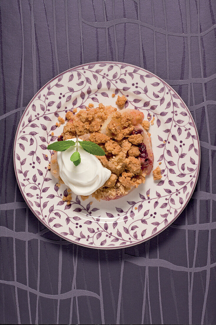 Pear crumble with cream topping