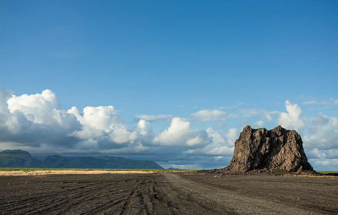 Monolith and black sand beach, south coast, Iceland