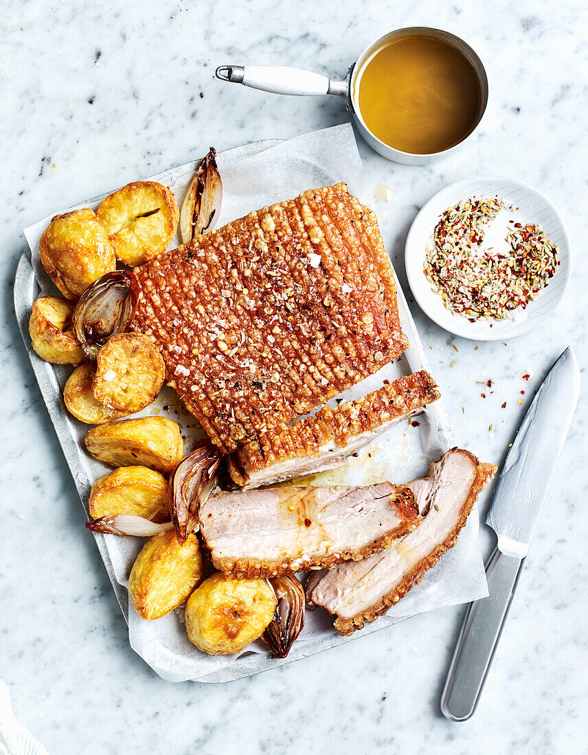 Roast pork belly with fennel, rosemary and chili salt