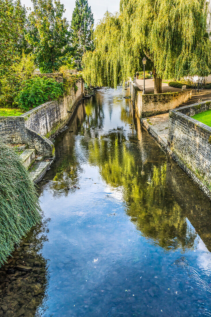 Colorful old buildings, Park Aure River reflection, Bayeux, Normandy, France. Bayeux founded 1st century BC