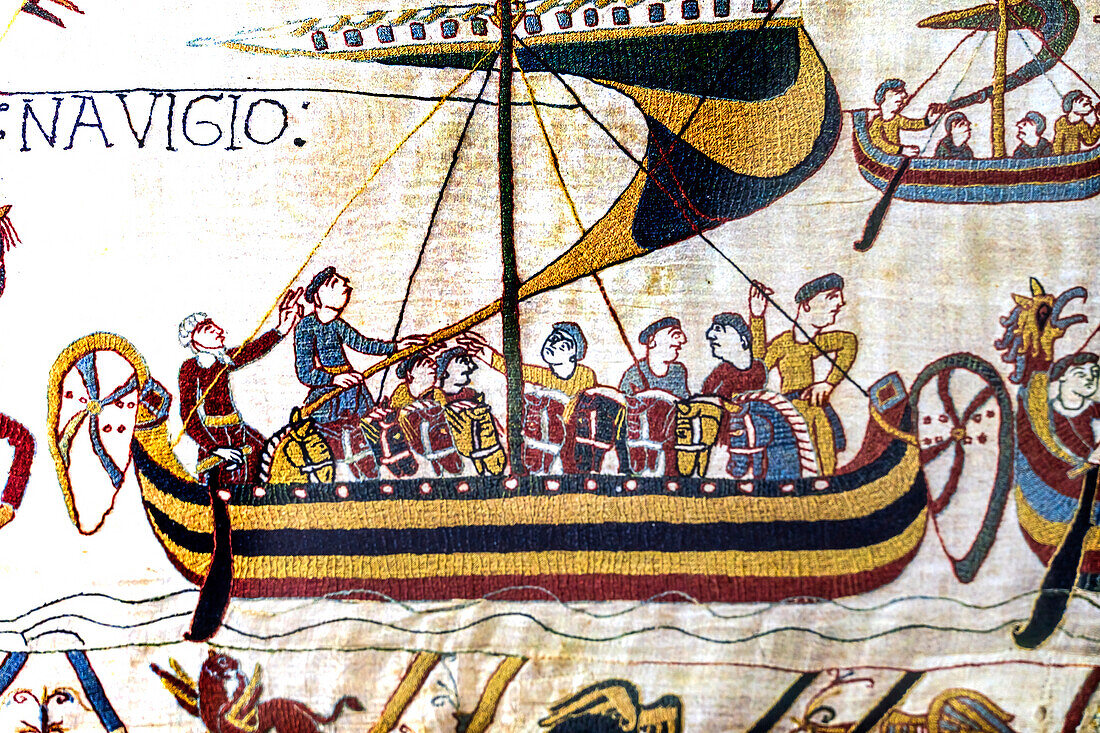 Colorful Medieval Bayeux tapestry, Bayeux, Normandy, France. Created 11th century right after Battle of Hastings 1066 AD showing Norman Conquest. Shows Norman Invasion Ship