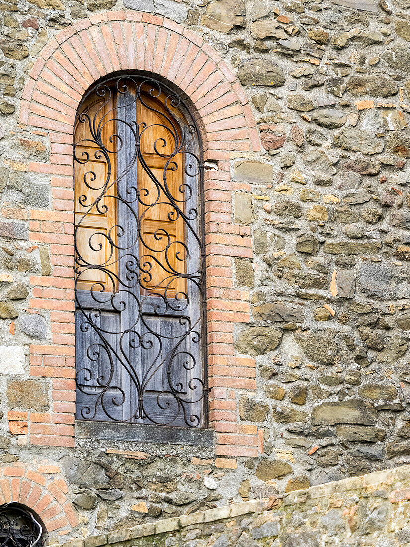 Italy, Tuscany, Province of Siena, Montalcino. Unique window with shutters.