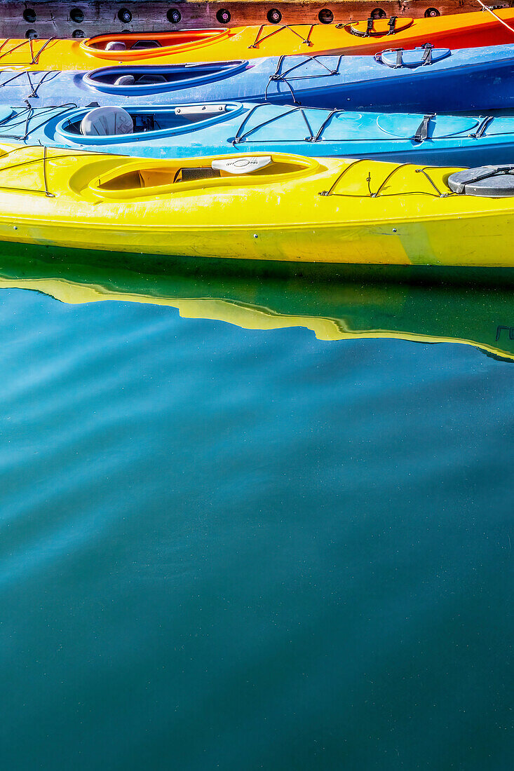 USA, Alaska, Homer. Colorful kayaks.